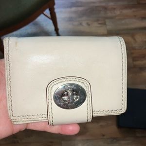 Coach turn lock wallet Tan With pink interior